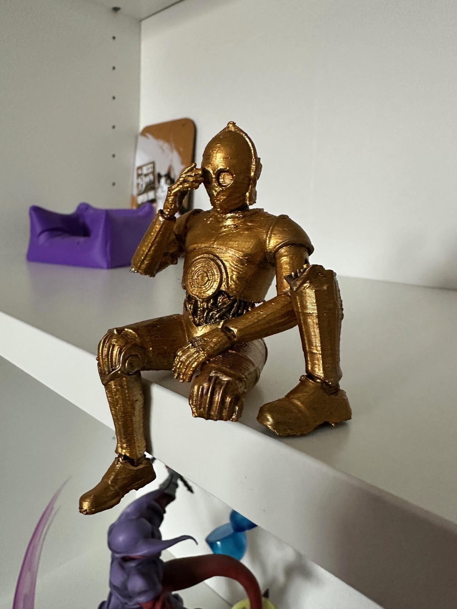 Robot doré à poser – Décoration sci-fi peinte à la main